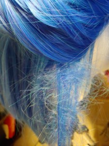 Heated and teased wefts